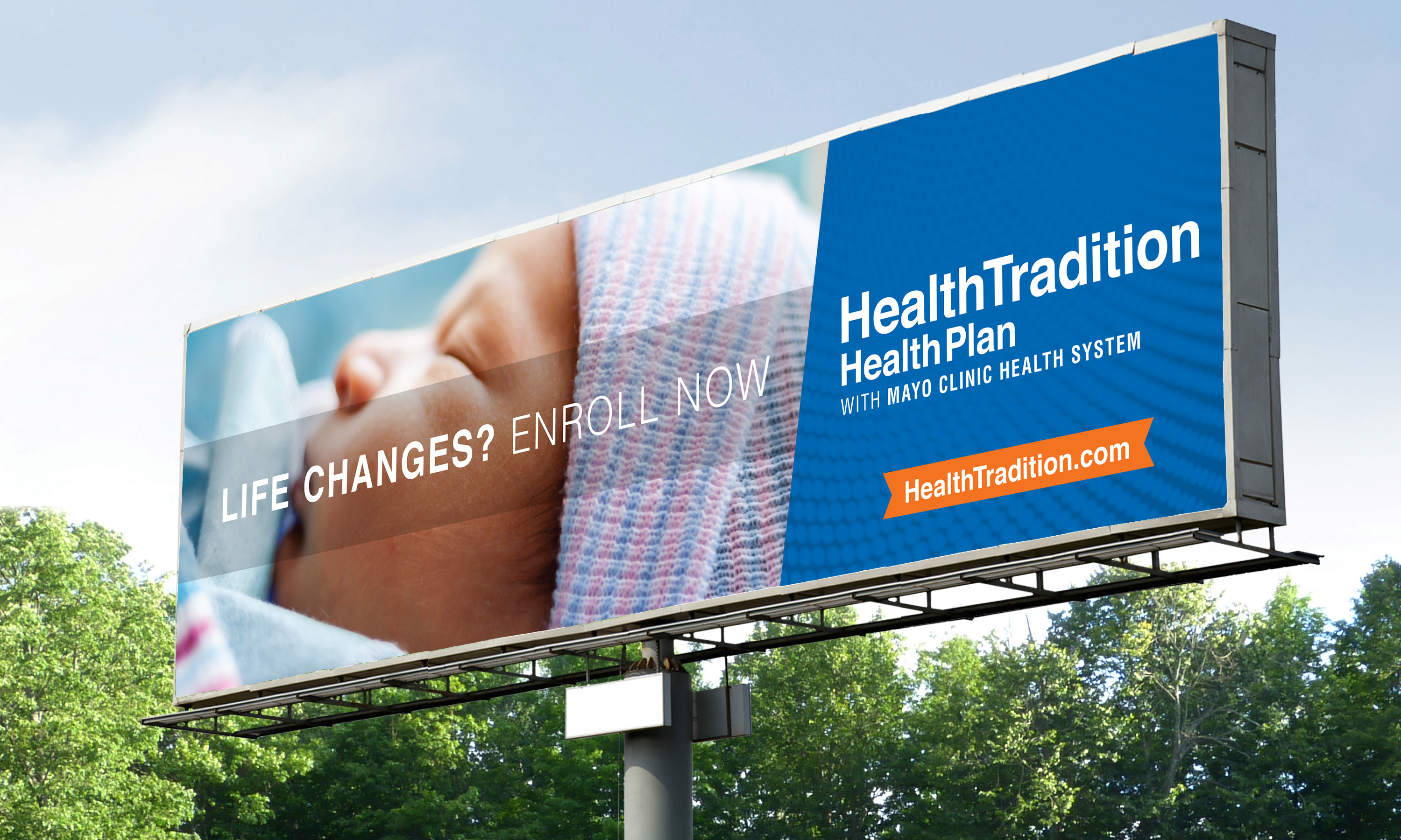 Health insurer billboard that reads life changes enroll now