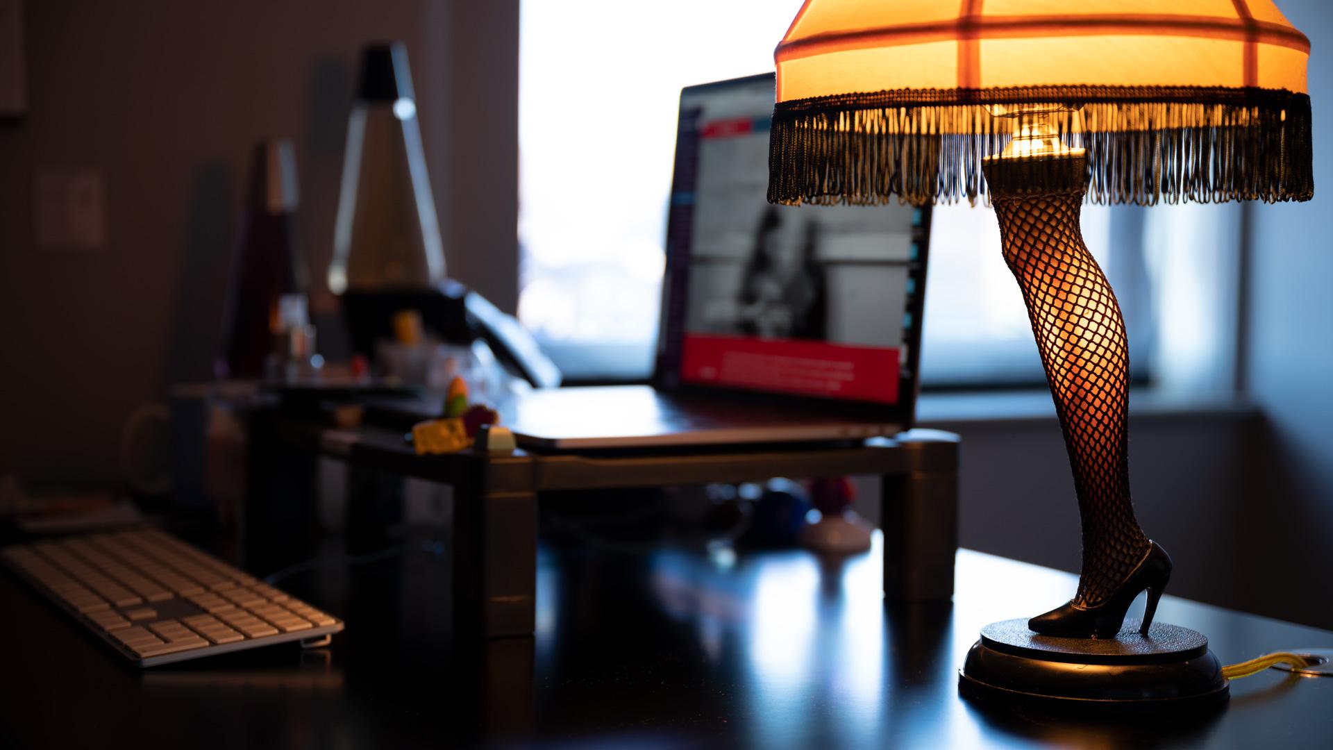 Closeup of a reproduction of the leg lamp from A Christmas Story on a desk at Vendi Advertising