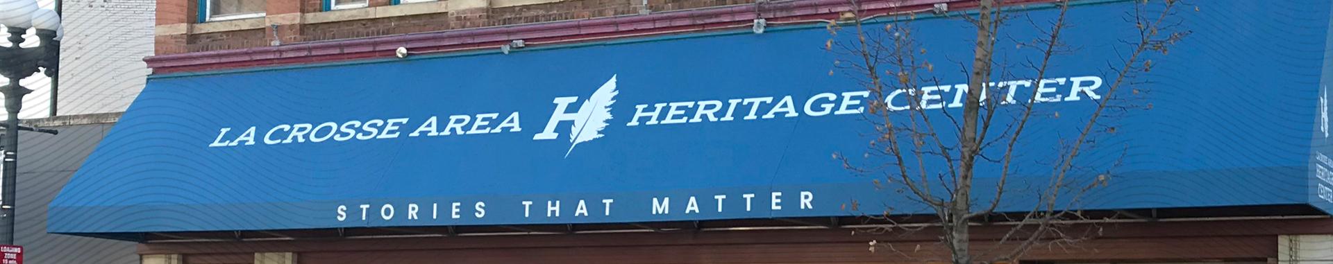 La Crosse Heritage Center building awning with Vendi-created logo and tagline reading stories that matter